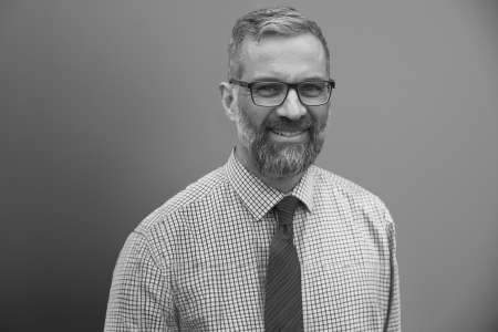 Grey photo of Alex Zachopoulos